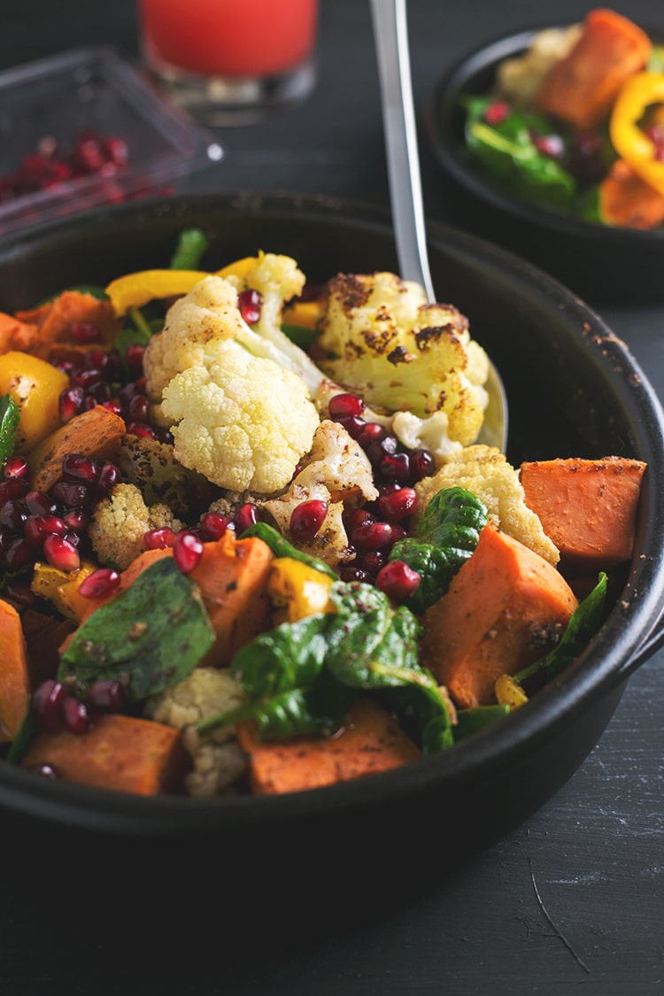 Roasted Cauliflower and Sweet Potato Salad with Cumin Sumac Dressing #sumac #cumin #cauliflower #sweetpotato #vegan #salad #healthy #pomegranate #rainbow #lowfat