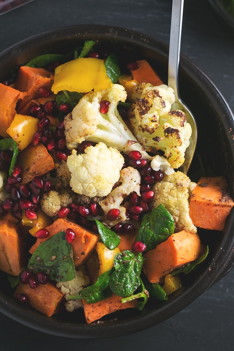 Roasted Cauliflower and Sweet Potato Salad with Cumin Sumac Dressing #sumac #cumin #cauliflower #sweetpotato #vegan #salad #healthy #pomegranate #rainbow #lowfat